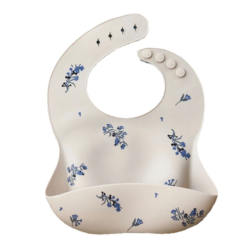 Mushie Silicone Baby Feeding Bib with Pocket