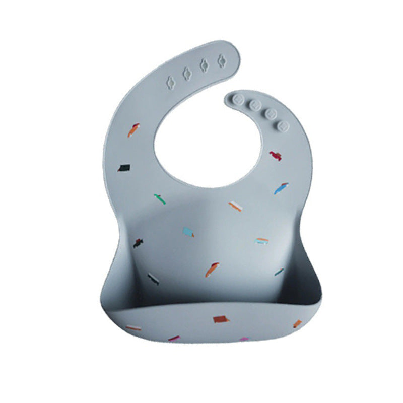 Mushie Silicone Baby Feeding Bib with Pocket